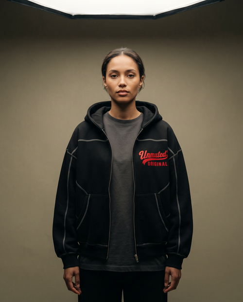 Model wearing the Unmuted Contrast-Stitch Zip Hoodie