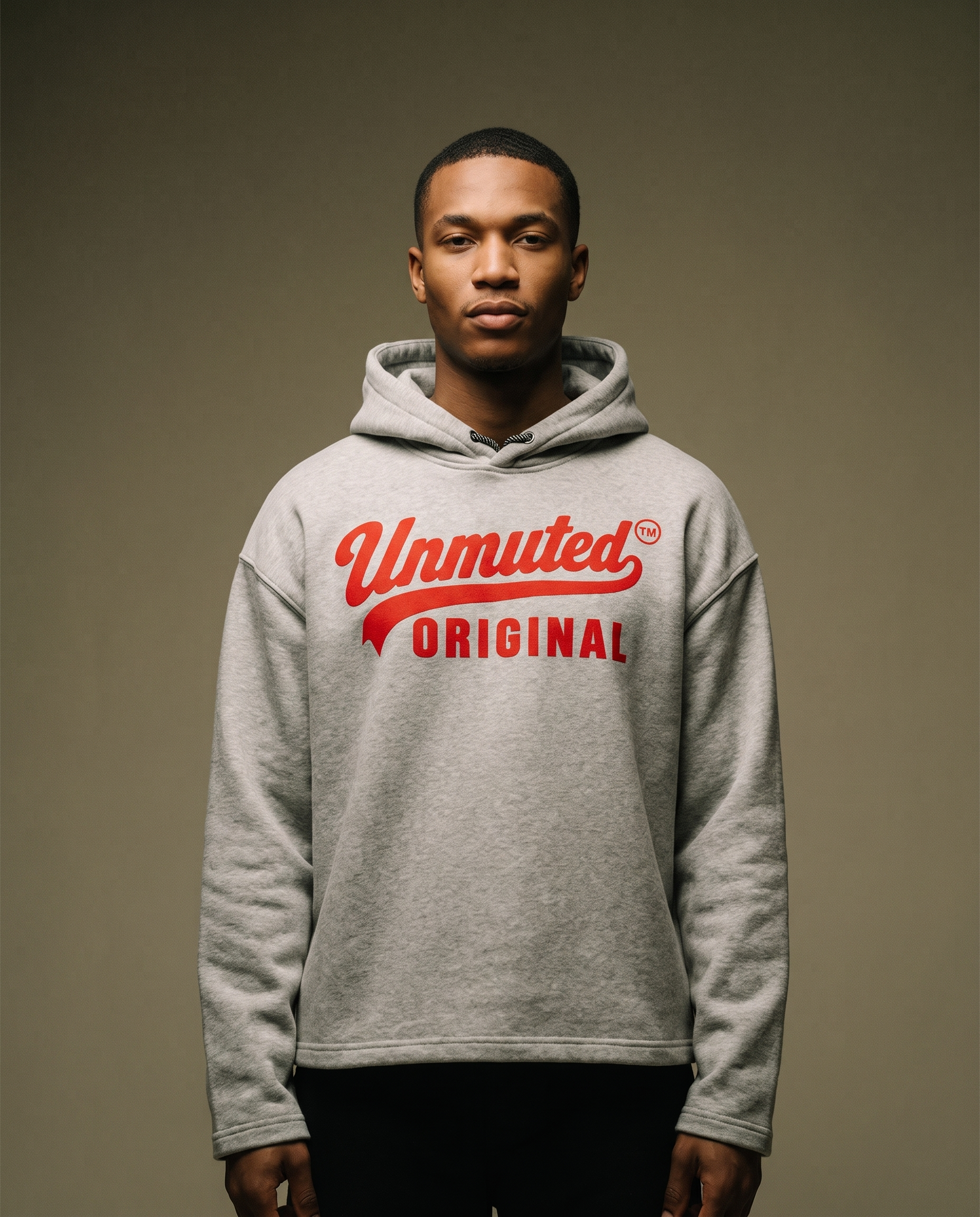Model wearing the Unmuted Heavyweight Fleece Hoodie